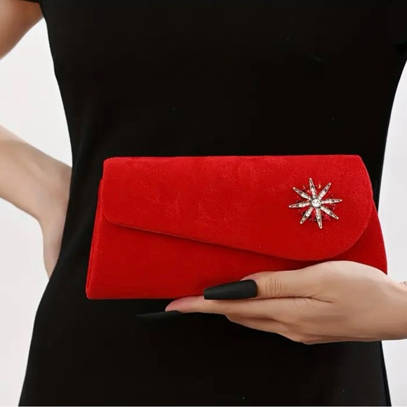 Elegant Red Clutch with Starburst Accent